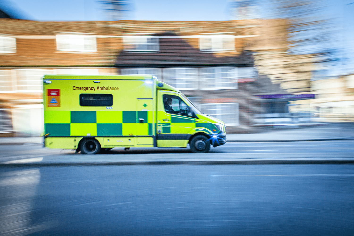 Stock photo of an ambulance driving fast